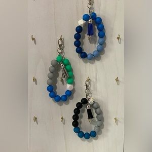 Beaded wristlet keychain with 15mm silicone beads assorted colors.